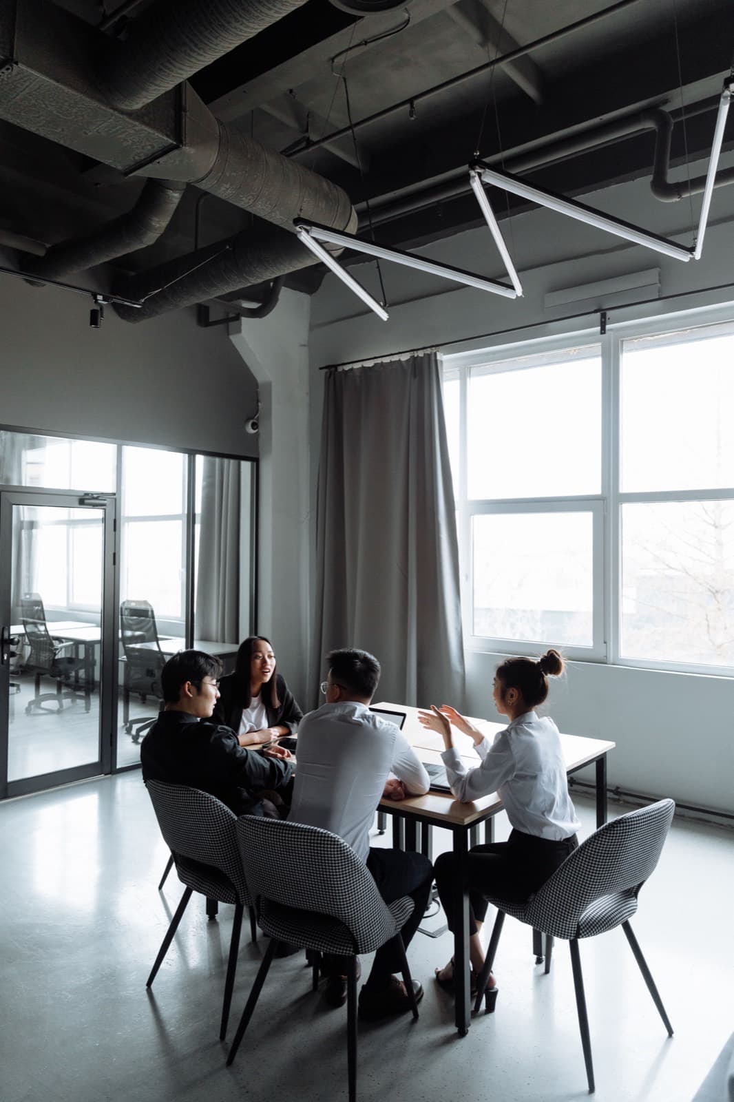 The iLex Projects team in a planning meeting